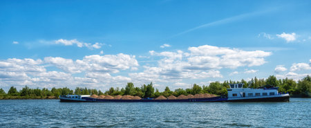 A barge transporting sand in Dutch River.の写真素材