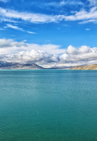 Located 3.500m above the sea level, along the road between Kashgar and Tashkurgan, the Kala Kule Lake offers some amazing sights and colors, Xinjiang, China.の写真素材