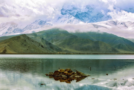 Located 3.500m above the sea level, along the road between Kashgar and Tashkurgan, the Kala Kule Lake offers some amazing sights and colors, Xinjiang, China.の写真素材