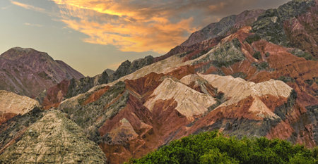 Rock formations, colorful mountains, eroded landscape and Gez river along Karakoram Highway, Xinjiang Autonomous Region, China.の写真素材