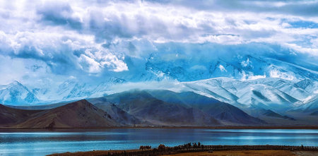 Located 3.500m above the sea level, along the road between Kashgar and Tashkurgan, the Kala Kule Lake offers some amazing sights and colors, Xinjiang, China.の写真素材