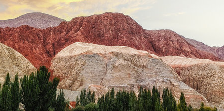 Rock formations, colorful mountains, eroded landscape and Gez river along Karakoram Highway, Xinjiang Autonomous Region, China.の写真素材