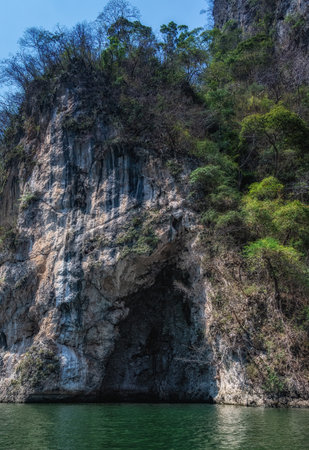 Shrine inside the Cueva de los Colores ,Cave of Colours in the Sumidero Canyon National Park near Chiapa de Corzo, Chiapas, southern Mexicoの写真素材