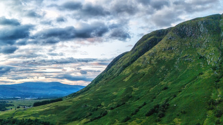 A beautiful shot of the rural hills from a Ben Nevis Viewpoint, Scottish Highlandsの写真素材
