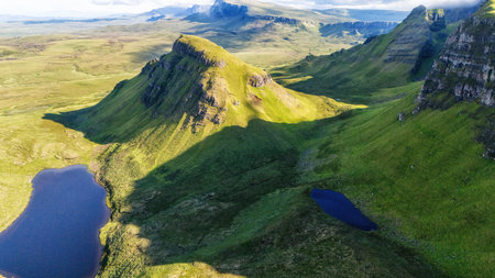 Drone view of Quiraing mountains in Isle of Skye, Scottish highlands, United Kingdom.