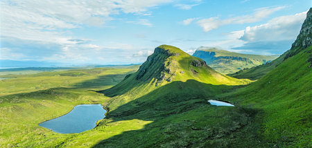 Drone view of Quiraing mountains in Isle of Skye, Scottish highlands, United Kingdom.