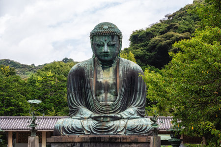 The Great Buddha or Daibutsu of Kamakura, an 11.4 meter tall bronze statue of the Amida Buddha completed in the 13th century, is one of Kamakura's most famous religious sites."の写真素材