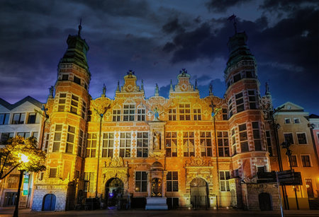 Old baroque style great armory at night in Gdansk, Poland