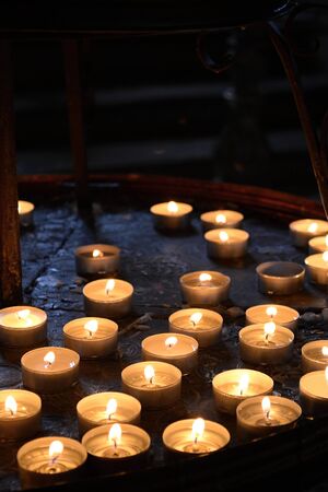 Candles and candlestick - small lighting candlesの写真素材