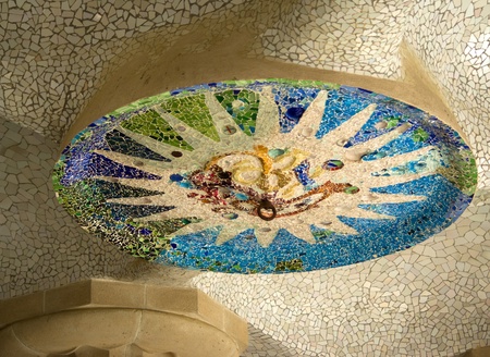BARCELONA -  Park guell in Barcelona with mosaic medallions on the ceiling of the terrace   in Barcelona, Spainのeditorial素材
