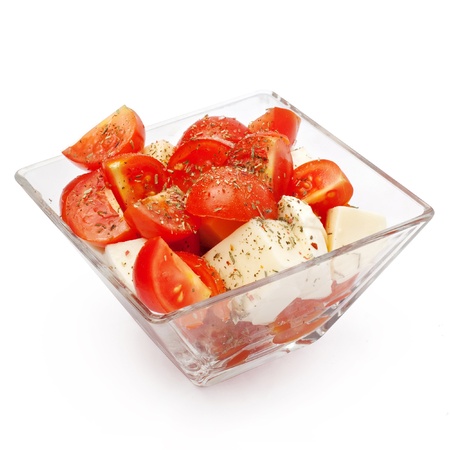 mozzarella salad with cherry tomatoes, with spicesの写真素材