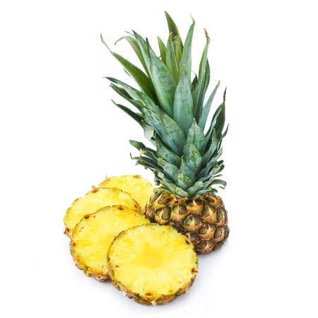 Ripe pineapple with lush green leavesの写真素材