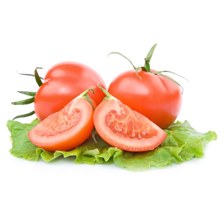two fresh red tomato with cut isolated on whiteの写真素材