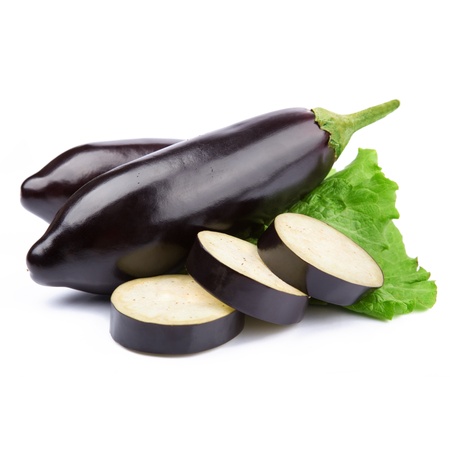 aubergine vegetable decorated with lettuce leaves isolated on whiteの写真素材