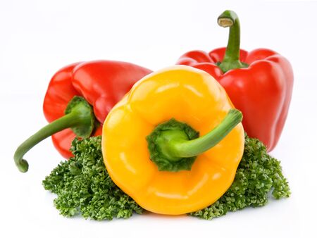 three fresh sweet pepper isolated on white backgroundの写真素材