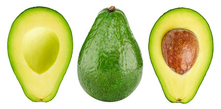 Avokado fruit. Whole and half avocado isolated on white background close-up.の写真素材