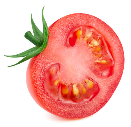 Tomato half isolated on white background. Tomato vegetable clipping path. Tomato macro studio photo.の写真素材