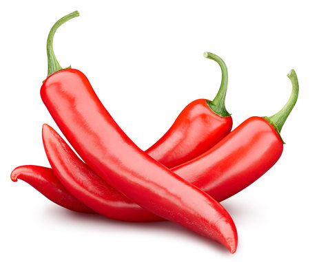 Red hot natural chili pepper. Fresh red peppers isolated on white background. Fresh organic fruit.の写真素材
