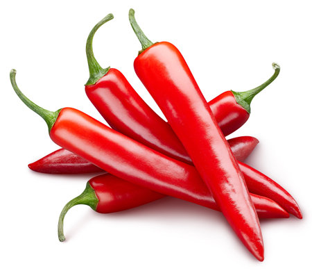 Chili isolated on white background. Chili pepper macro studio photo. Chili with leaves. With clipping pathの写真素材