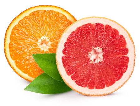 Grapefruit and orange half isolated on white background. Grapefruit half macro studio photo.の写真素材