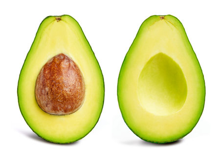 Avocado isolated on white background. Avocado fruit. Avocado half macro studio photoの写真素材