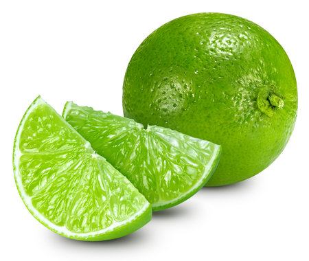 Pile of lime . Lime with and slices on white background. Lime macroの写真素材