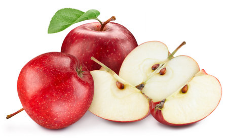 Two whole ripe red apples with slice. Red apples with leaves.の写真素材