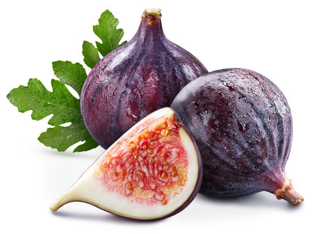 Fig fruit with leaves. Fig full macro shoot food ingredient on white isolated.の写真素材