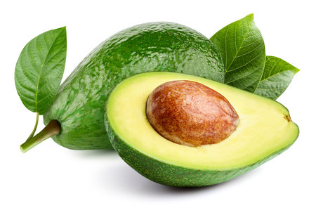 Ripe avocado with leaves. Organic avocado isolated on whiteの写真素材