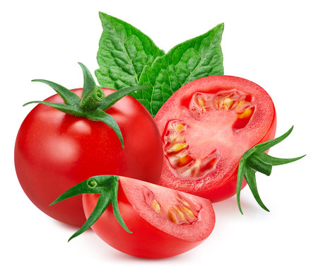 Tomato fruit with tomato leaf isolated on whiteの写真素材