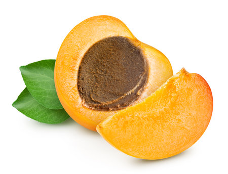 Apricot with slice and leaves retouched and isolated white backgroundの写真素材