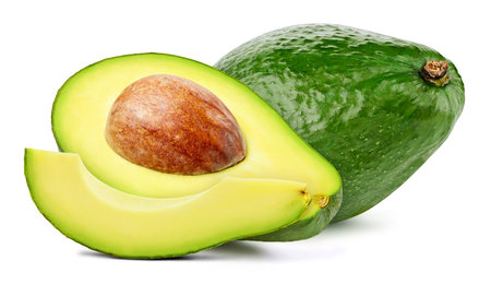 Fresh organic avocado isolated clipping path. Avocado macro studio photo. Isolated peach.の写真素材