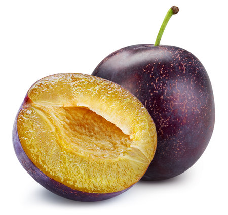 Plum isolated on the white background. Plum half. Fresh fruits isolated on white backgroundの写真素材