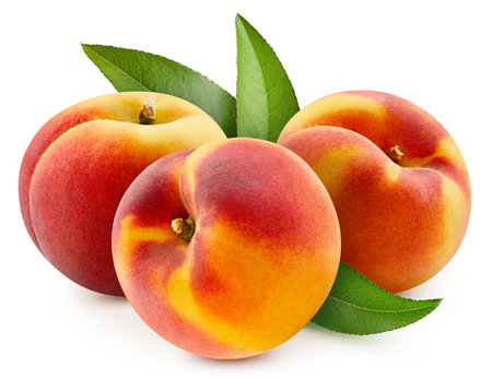 Peach fruit with peach leaf isolated on white background.の写真素材