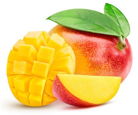 Juicy mango isolated on the white background. Mango half and slice. Fresh fruits isolated on white backgroundの写真素材