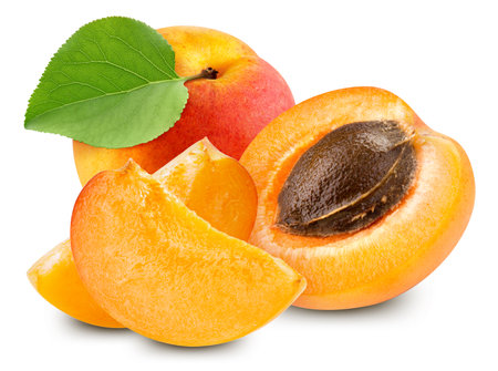 Apricot fruit with leaf isolate. Apricot slice and half on white.の写真素材