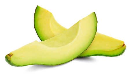 Fresh avocado slices isolated on white background.の写真素材