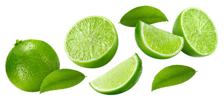 Flying in air lime collection. Set organic lime and leaves isolated on white background.の写真素材