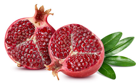 Pomegranate half. Fresh organic pomegranate isolated on white background. Pomegranate macro with clipping pathの写真素材