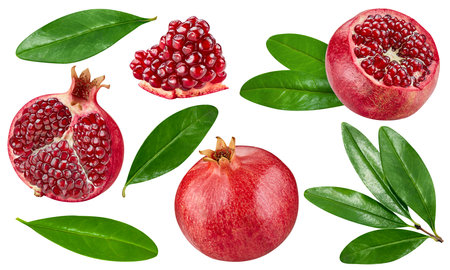 Pomegranate collection with leaves isolated on white background. Pomegranate set Clipping Path. Pomegranate macro studio photoの写真素材