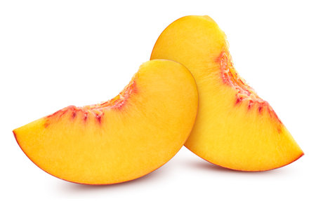 Peach slice isolated on white background. Peach with clipping path. Peach macro studio photoの写真素材