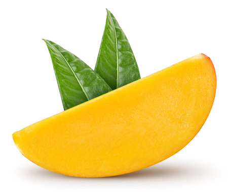 Mango fruit slices and mango leaves over whiteの写真素材