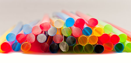 Many colorful  straws on the white backgroundの写真素材