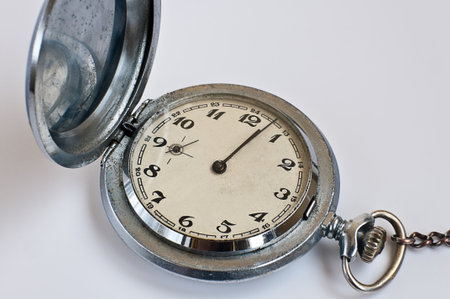 open pocket Watch on the white backgroundの写真素材