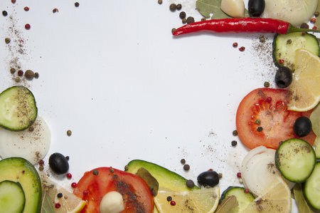 Framed with tomatoes  cucumbers  bow  salt and pepperの写真素材
