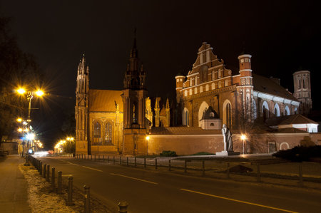 Ensemble of St.Anna chuch and Bernardine Church in Vilnius at night timeの写真素材