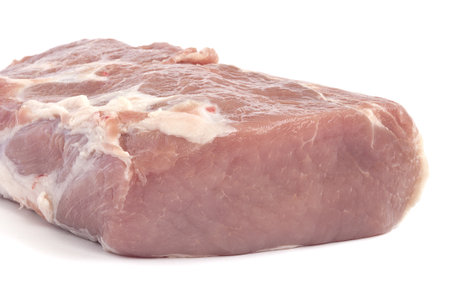raw pork on a white backgroundの写真素材