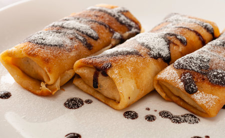 Chocolate pancakes on a plateの写真素材