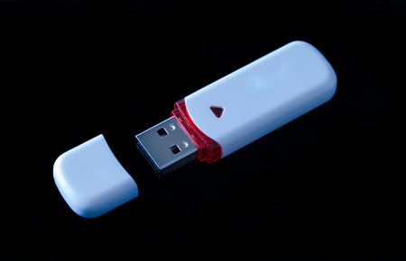 white usb key on a black backgroundの写真素材