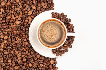 a cup of coffee and coffee beans.の写真素材